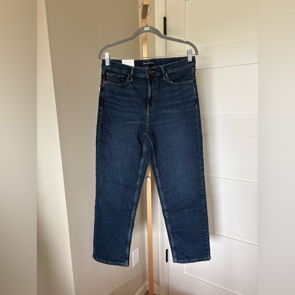 Calvin Klein Jeans . Size 8. Dark Blue. NWT. 99% cotton. 1% spandex